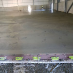 Large warehouse with newly laid concrete floor