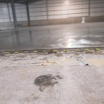 Close up of recently poured concrete flooring for a warehouse